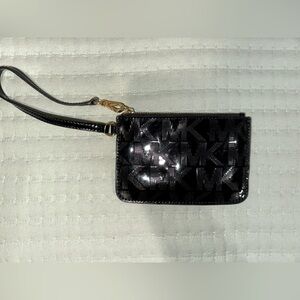 Michael Kors Black MK signature Wristlet. GUC